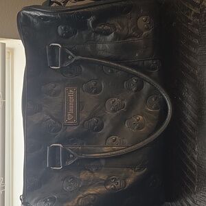 Loungefly Black Embossed Skull Duffel Bag